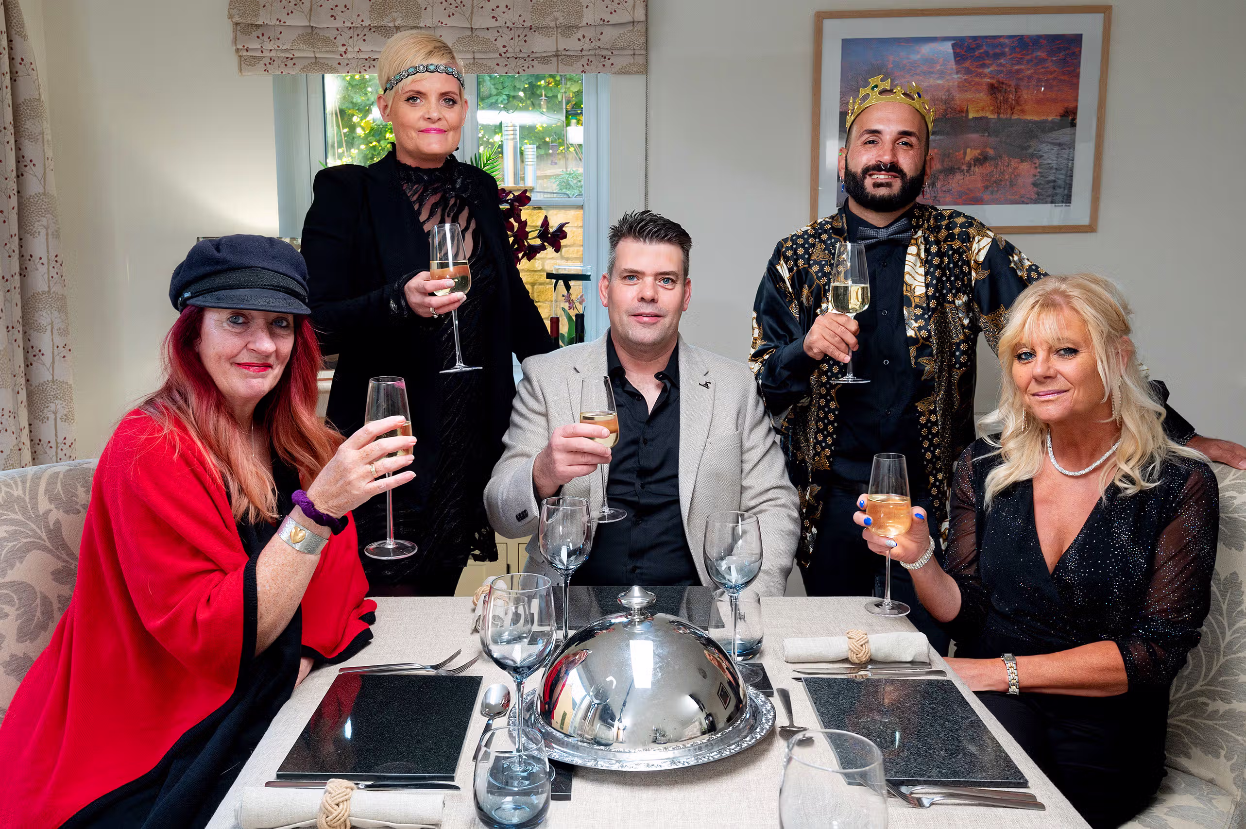 TV stills photographer capturing ITV ‘Come Dine With Me’ contestants during a dinner party in Tetbury.